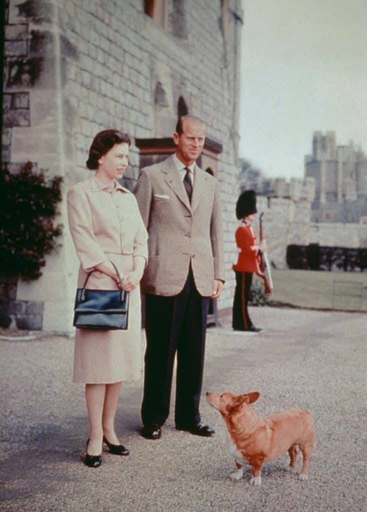Queen Elizabeth and Prince Philip with one of their prized Corgis